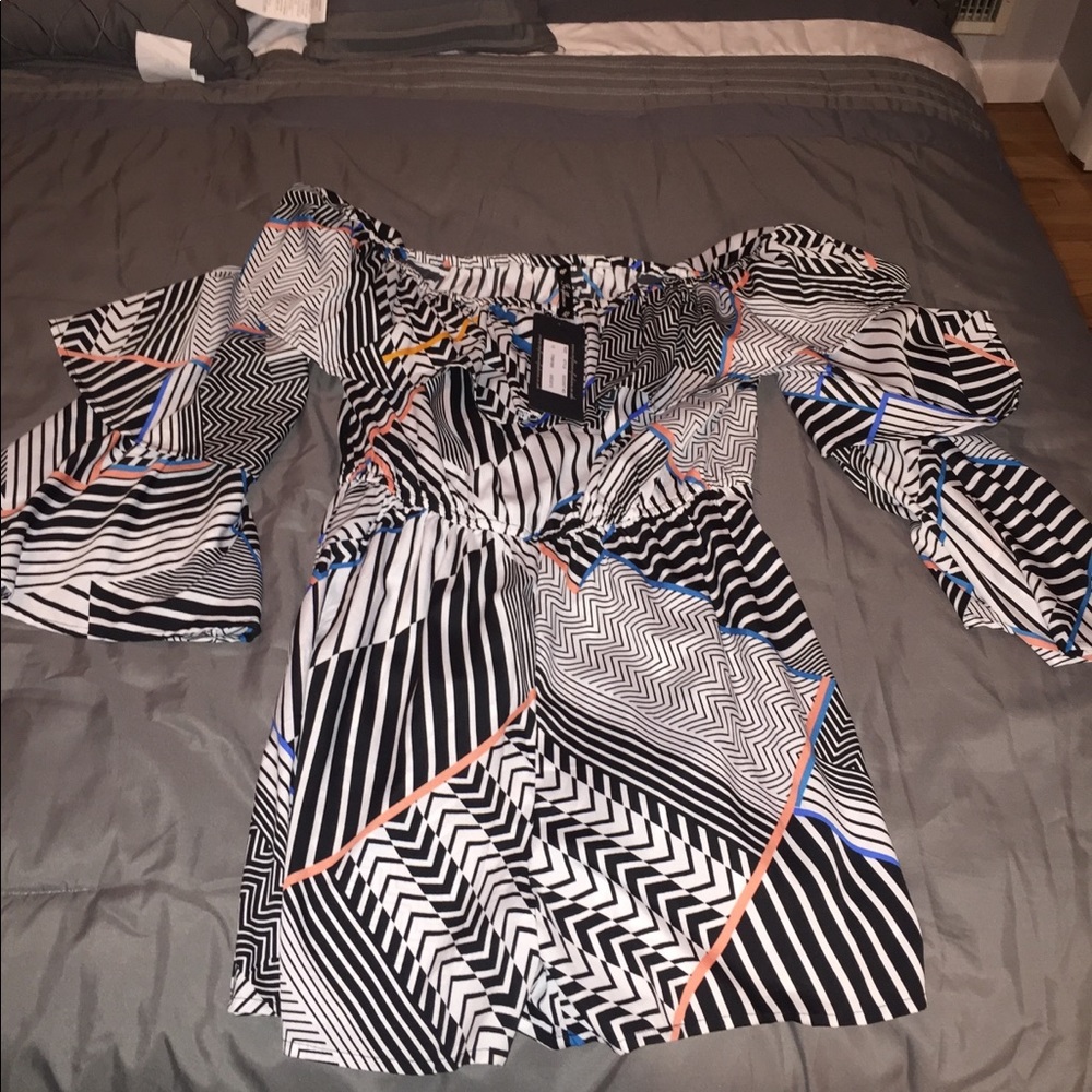 Never before worn romper.
